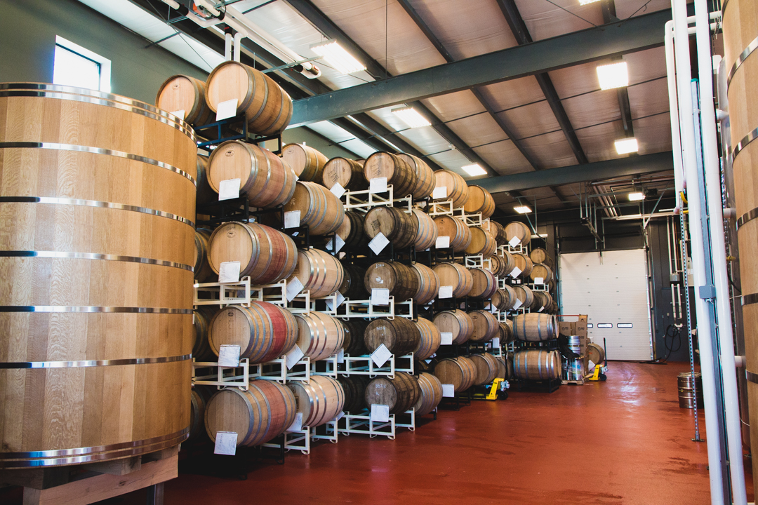 oak barrels agin upland sours in the wood shop